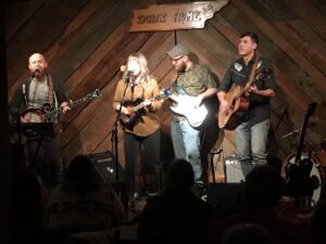 Photograph of band on stage at the Down Home music venue downtown Johnson City, TN